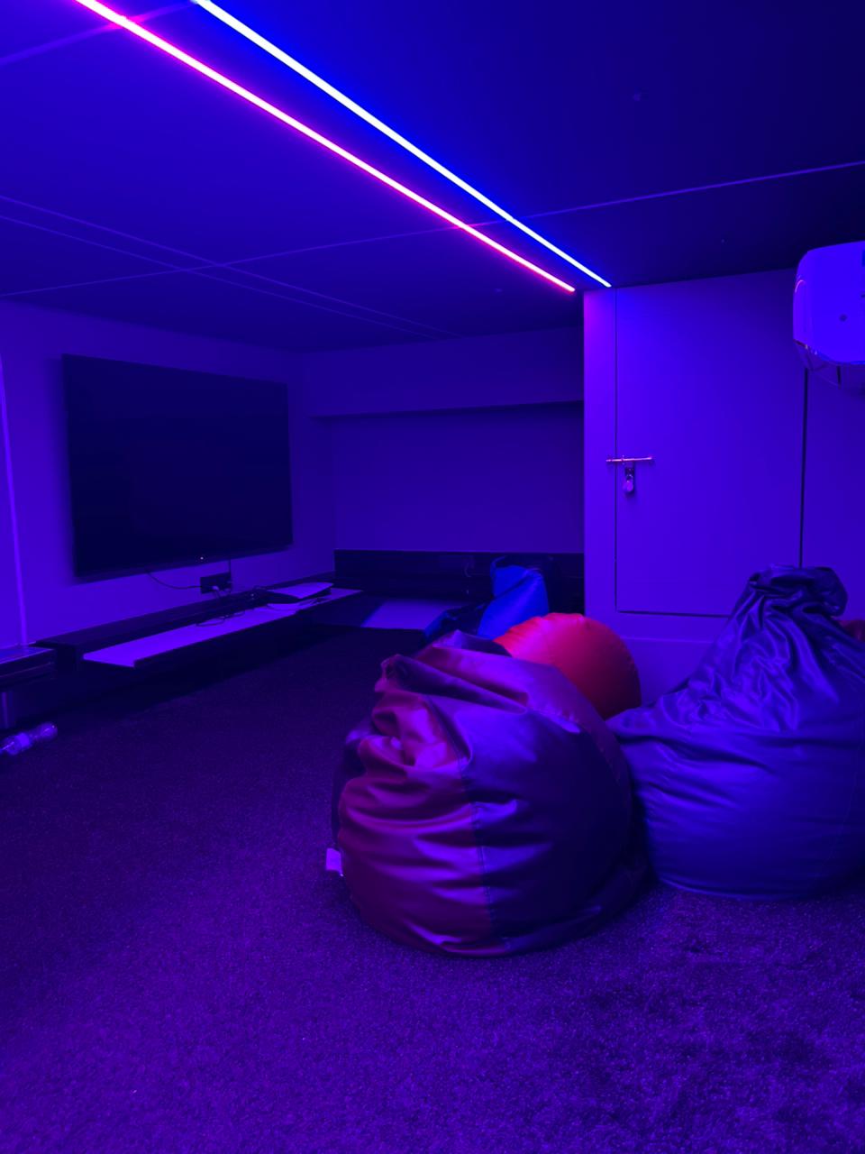 Neon lit gaming lounge